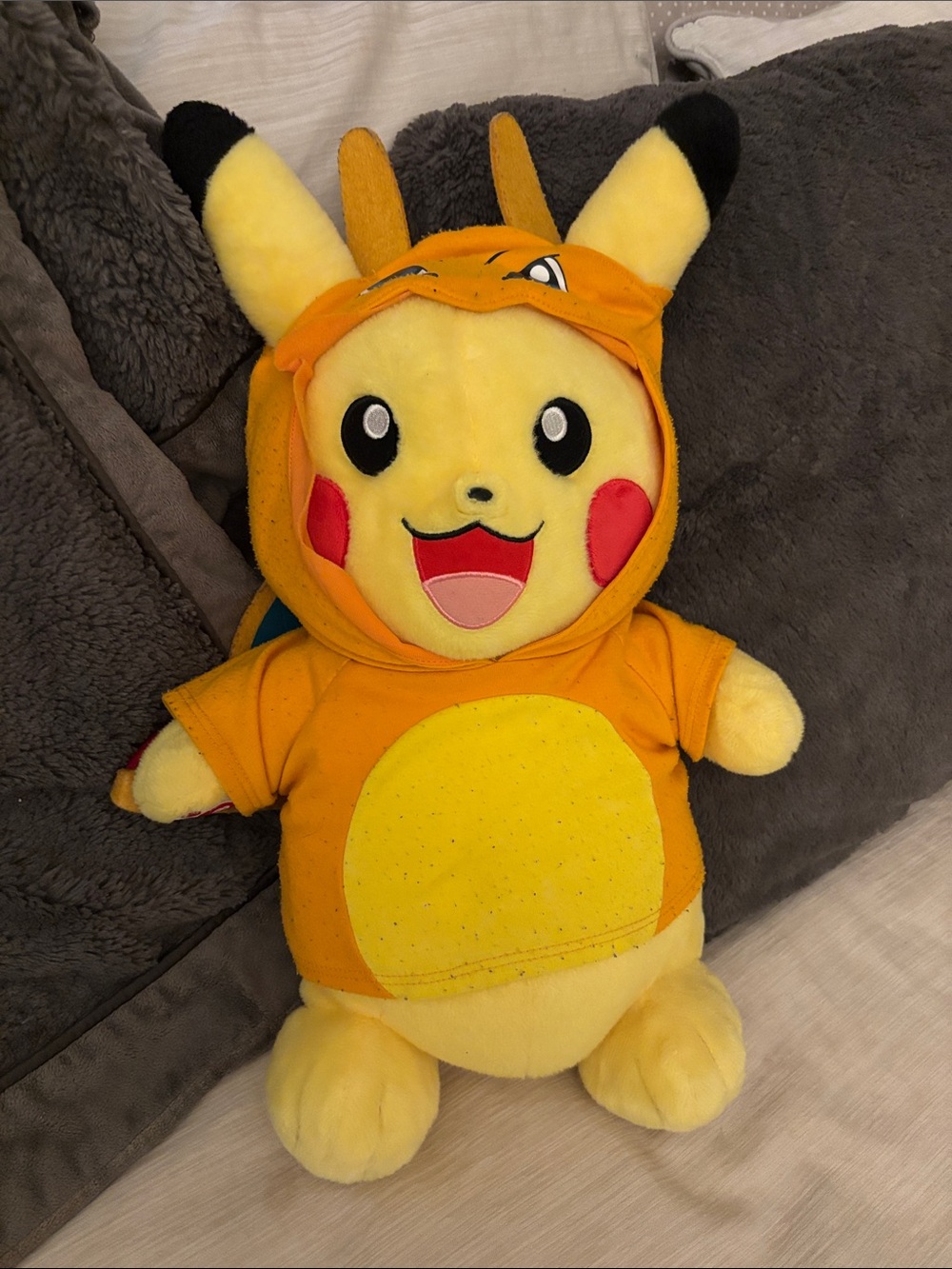 Pikachu Plush in Orange Charizard Hoodie - Licensed Pokémon Stuffed Toy